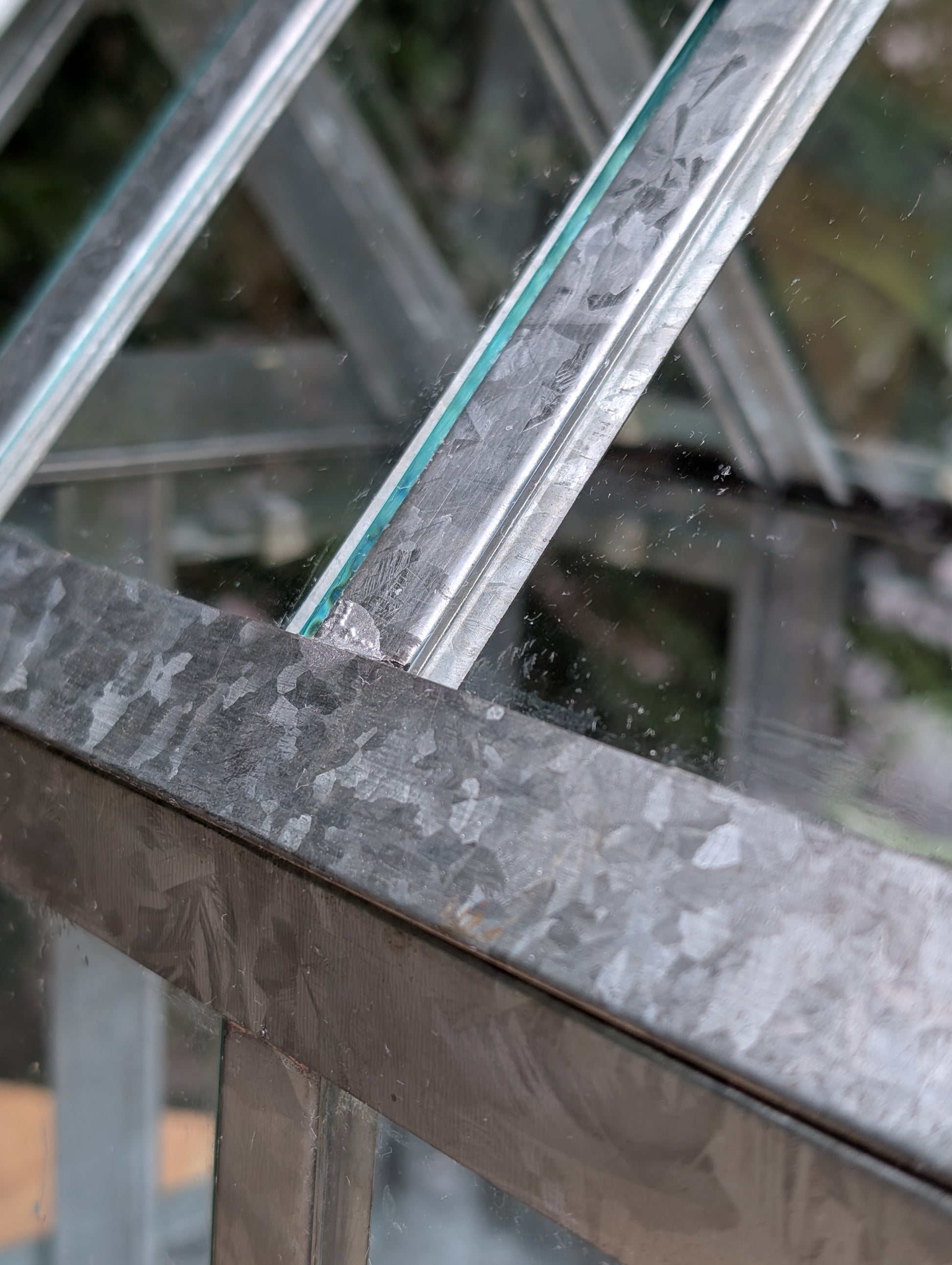 Bring the charm of a Victorian conservatory indoors with this decorative galvanized metal and glass tabletop greenhouse. Perfect for displaying succulents, moss gardens, candles, seasonal décor, or treasured collectibles, it adds timeless botanical style to any room.