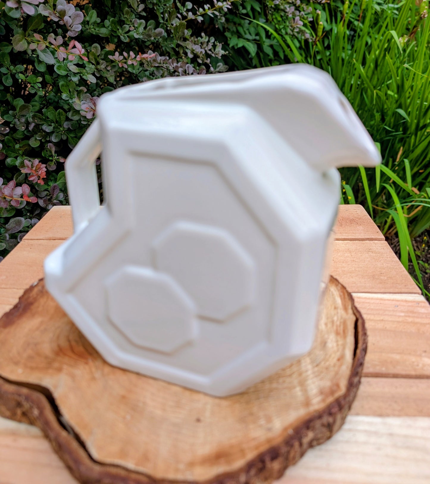 Bring timeless American Art Deco design into your home with this vintage Alamo Pottery Shape No. 758 pitcher. Its crisp geometric silhouette and glossy white glaze make it equally beautiful as a functional pitcher, sculptural vase, or decorative accent.