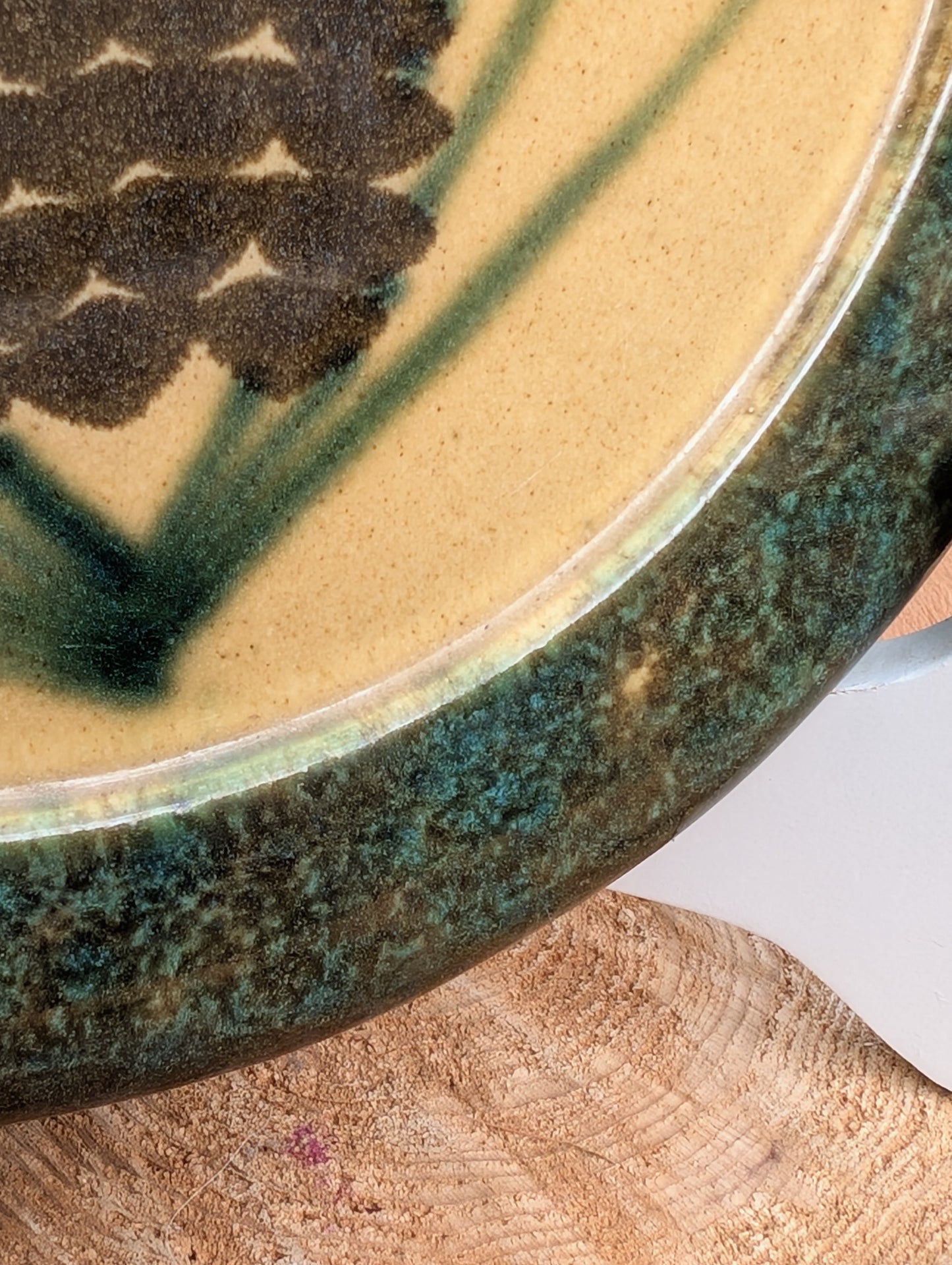 Bring the warmth of the forest to your table with this handcrafted Monroe Salt Works Pine Cone dinner plate. Featuring a classic salt-glazed finish and timeless woodland motif, this beautifully made stoneware piece blends everyday function with rustic New England craftsmanship.