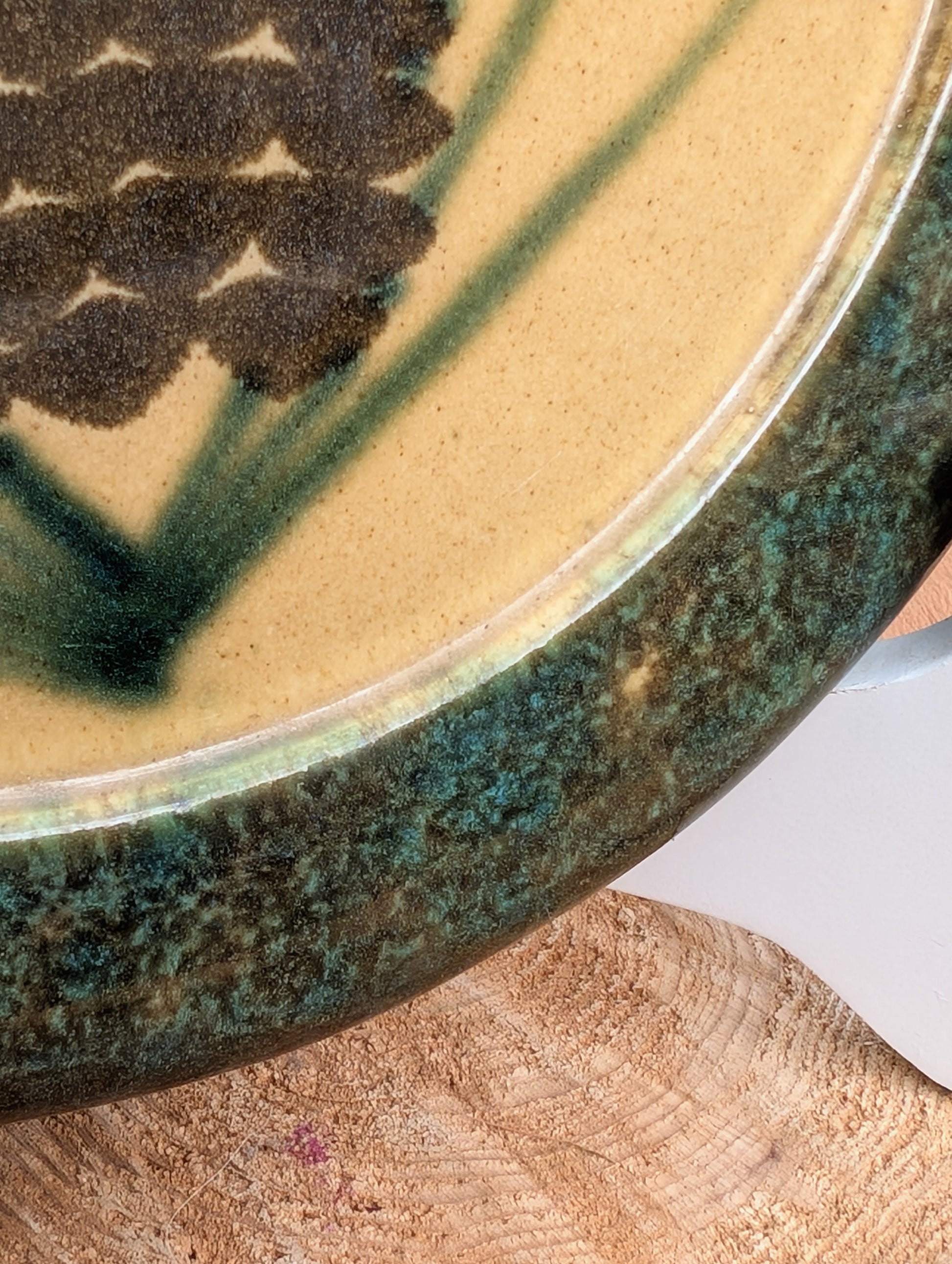 Bring the warmth of the forest to your table with this handcrafted Monroe Salt Works Pine Cone dinner plate. Featuring a classic salt-glazed finish and timeless woodland motif, this beautifully made stoneware piece blends everyday function with rustic New England craftsmanship.