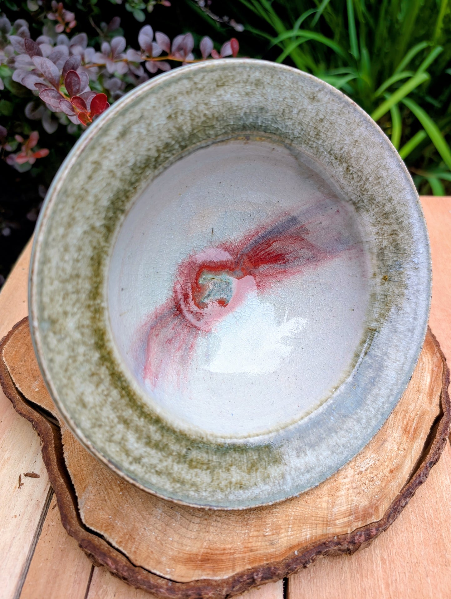 Handcrafted with timeless simplicity, this signed studio pottery serving bowl pairs a soft celadon-gray glaze with a warm iron-rich stoneware body. Its versatile size and understated design make it equally beautiful for serving, display, or everyday living.