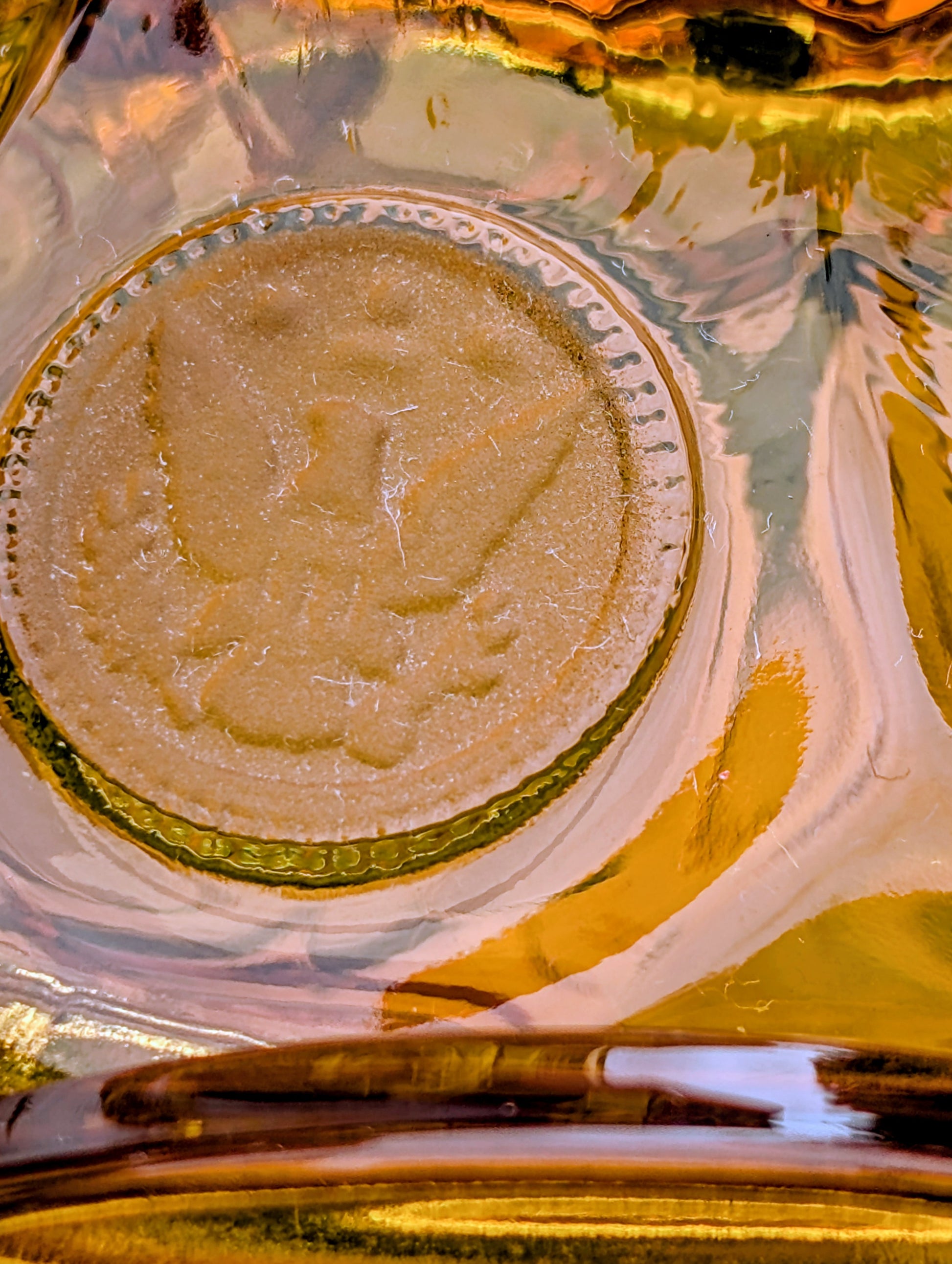 A stunning matching set of vintage Indiana Glass in the iconic Kings Crown (Coin) pattern. This coordinated amber glass collection includes a covered pedestal vase and matching covered candy dish, each with its original lid. A beautiful Mid-Century display for collectors and vintage home décor enthusiasts.