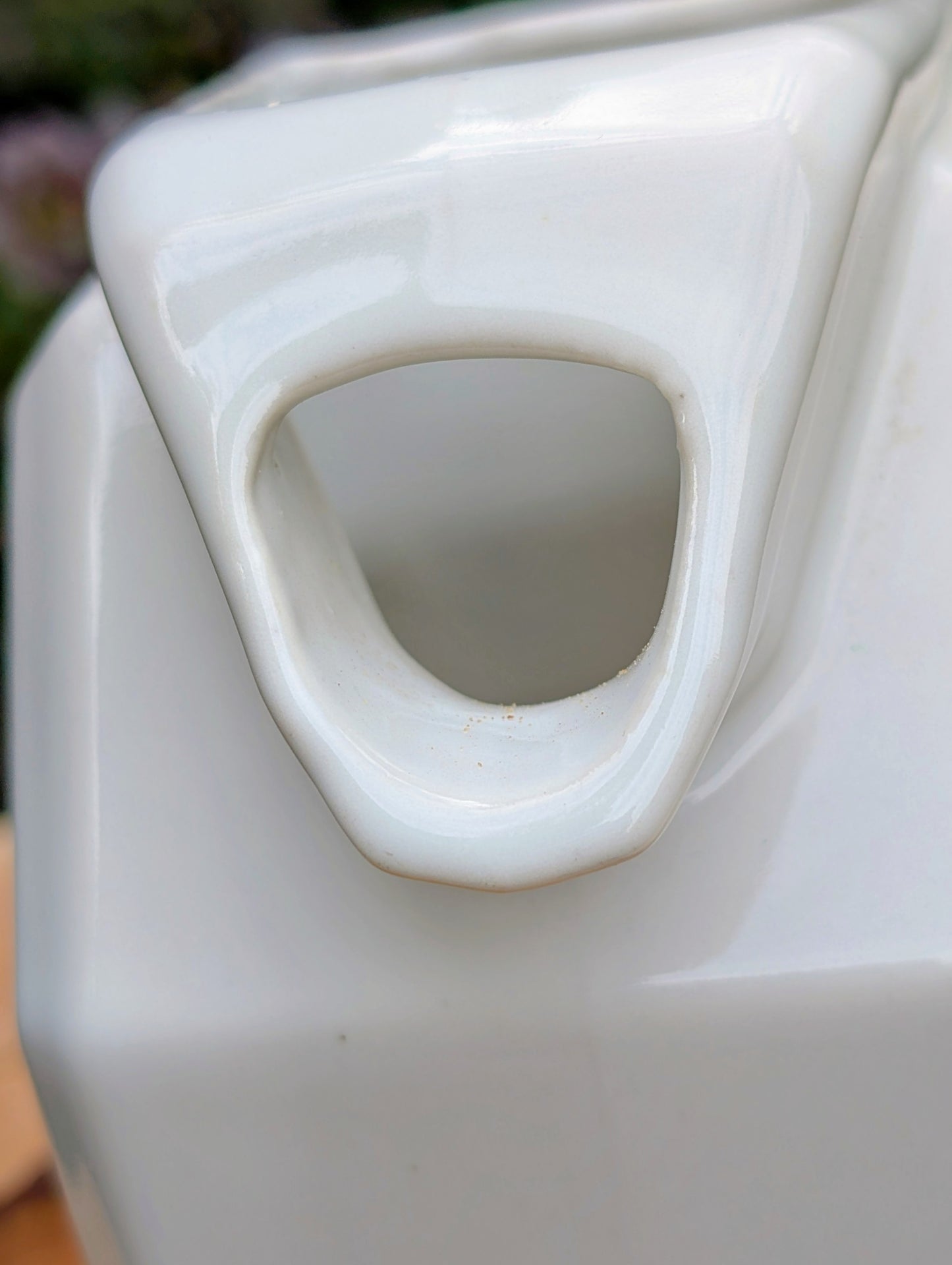 Bring timeless American Art Deco design into your home with this vintage Alamo Pottery Shape No. 758 pitcher. Its crisp geometric silhouette and glossy white glaze make it equally beautiful as a functional pitcher, sculptural vase, or decorative accent.